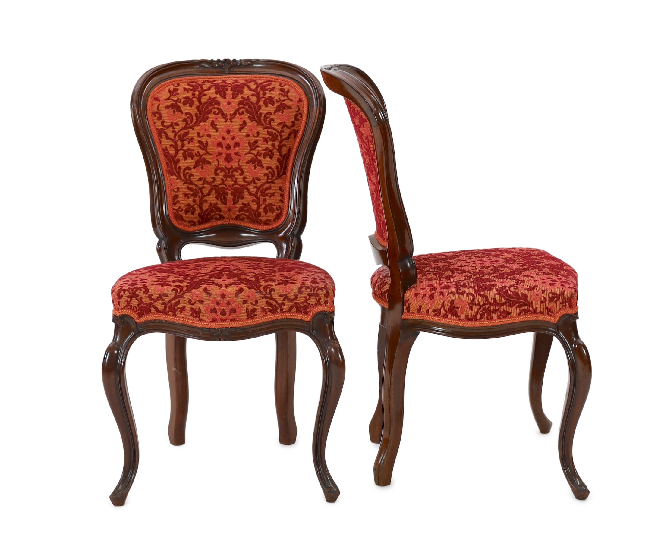 A set of twelve Victorian mahogany balloon back dining chairs, W.50cm D.46cm H.89cm